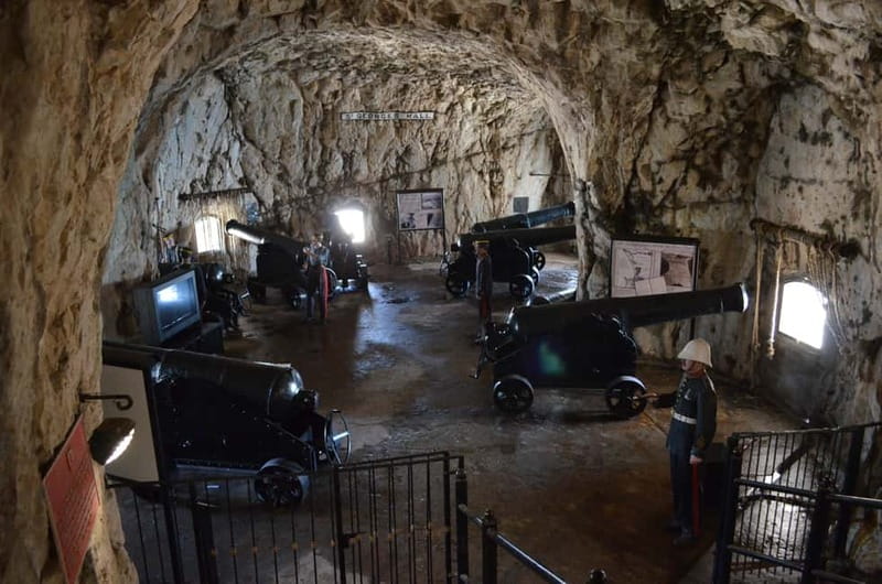 Gibraltar: Official City Pass with Rock Tour &20 Attractions - Moorish Castle, WW2 batteries, and the artillery outdoors