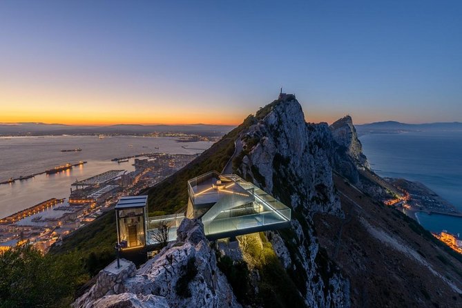 The Rock of Gibraltar above the town, the runway and the bay